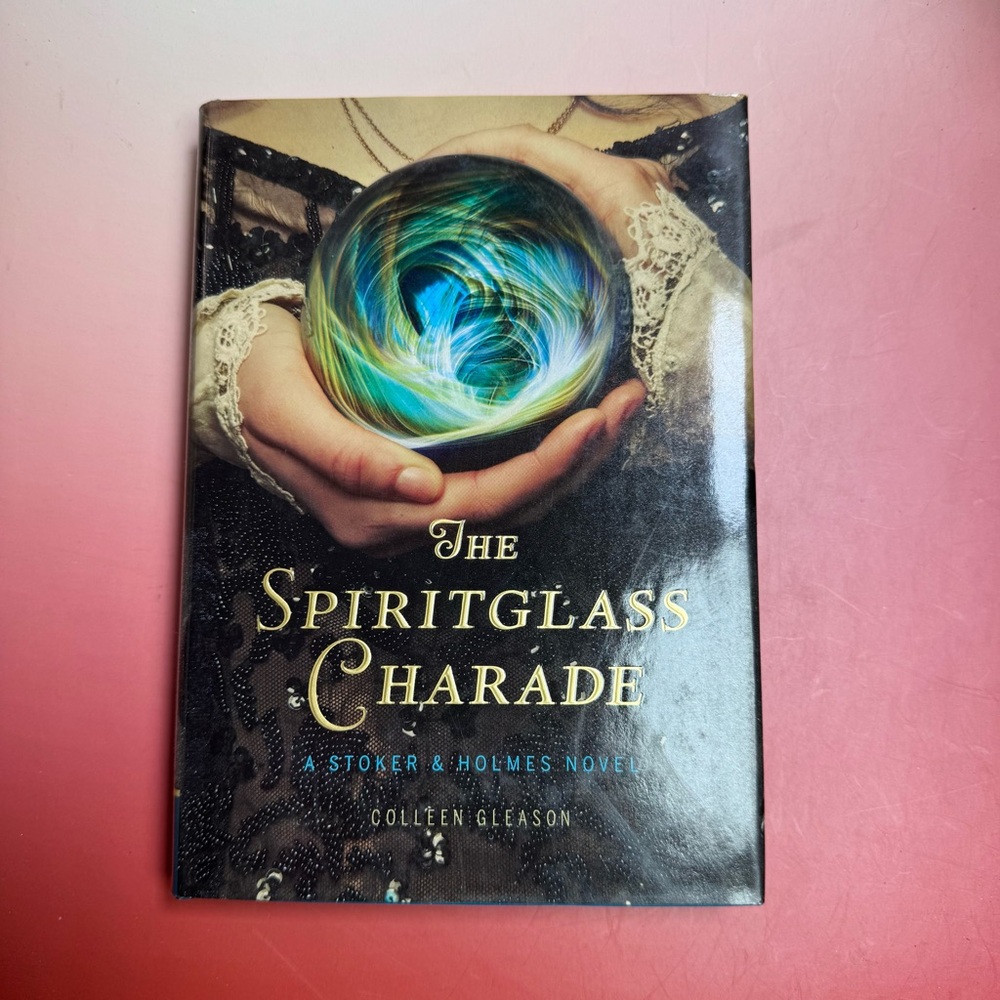 The Spiritglass Charade: A Stoker & Holmes Novel" by Colleen Gleason.
